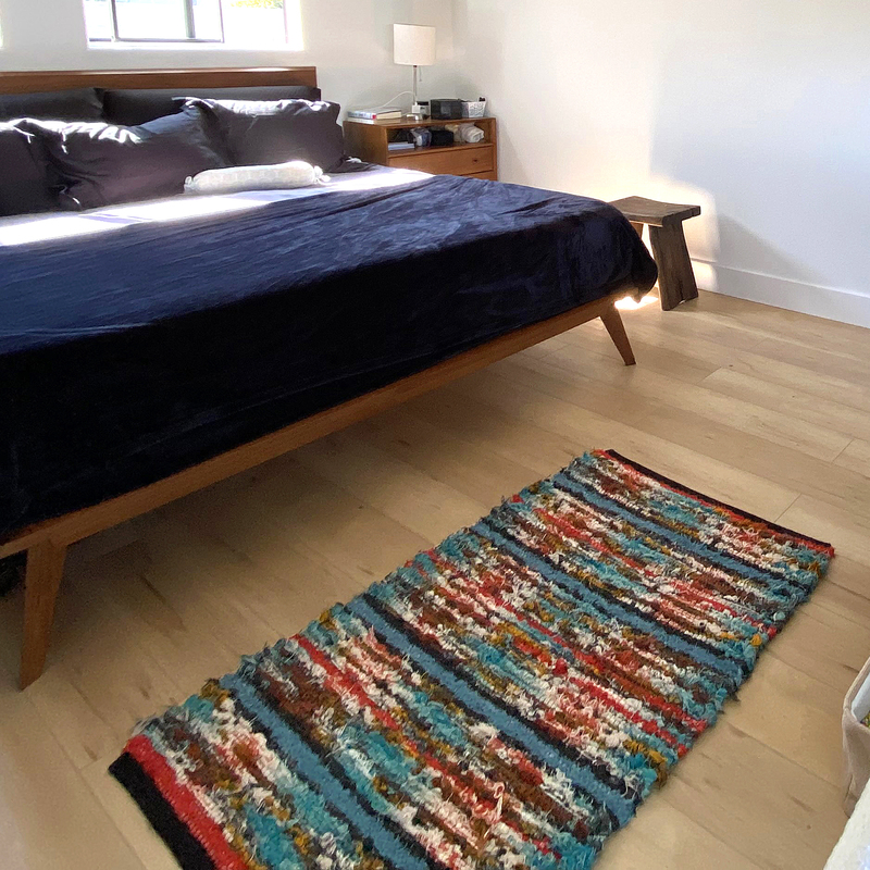 "We are so happy to have this eco-friendly, beautifully handwoven rug at the foot of our bed. And it feels so good on bare feet!" -Shane A.